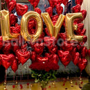 Golden L-O-V-E and Red Heart Foil and Red Roses Flower & Balloons Arrangement