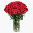 Classy Love Red Roses Fresh Flower Arrangement on a Glass Vase