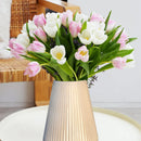 Elegance and Style Tulip Arrangement on a Glass Vase