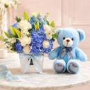 New born Baby Boy Bloom Box – White Lilies, Blue Accents & Soft Teddy Gift