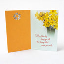 Greeting card with orange interior and floral design 