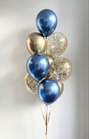 Bouquet of balloons in blue, gold, and silver 